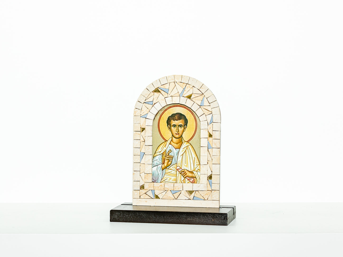 Mosaic icon of a religious figure on a white background