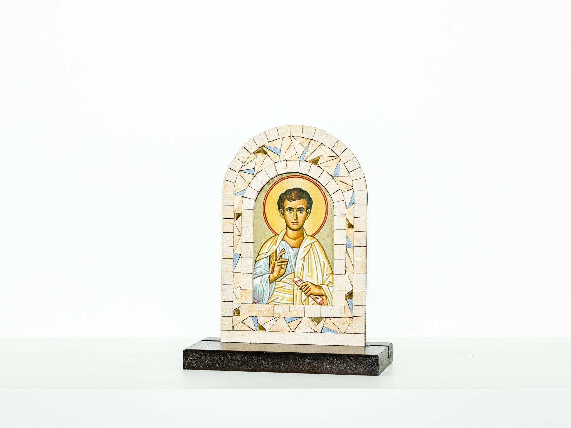 Mosaic icon of a religious figure on a white background