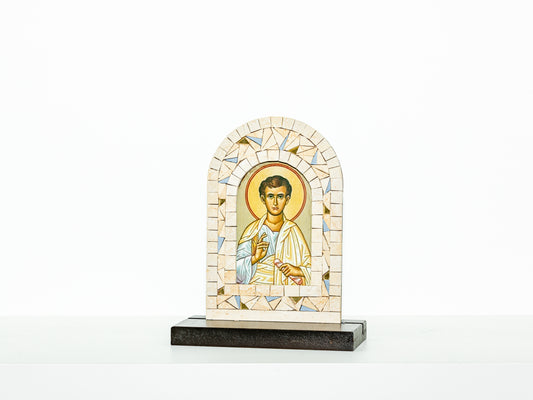 Mosaic icon of a religious figure on a white background